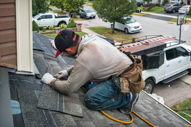 Professional Gutter Repair And Installation technician working in Russell, GA